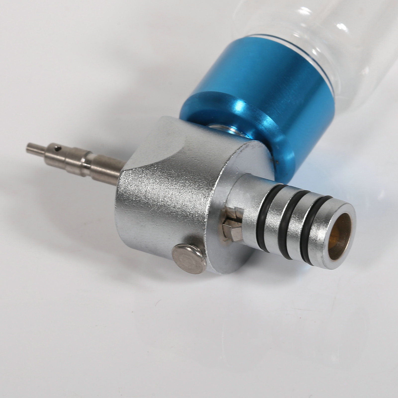 Dispositivo de Limpieza y Lubricación para Piezas de Mano Dentales de Baja Velocidad